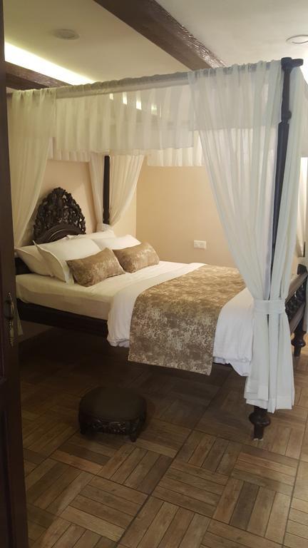 Casa Menezes - A Heritage Goan Homestay Bambolim Rum bild