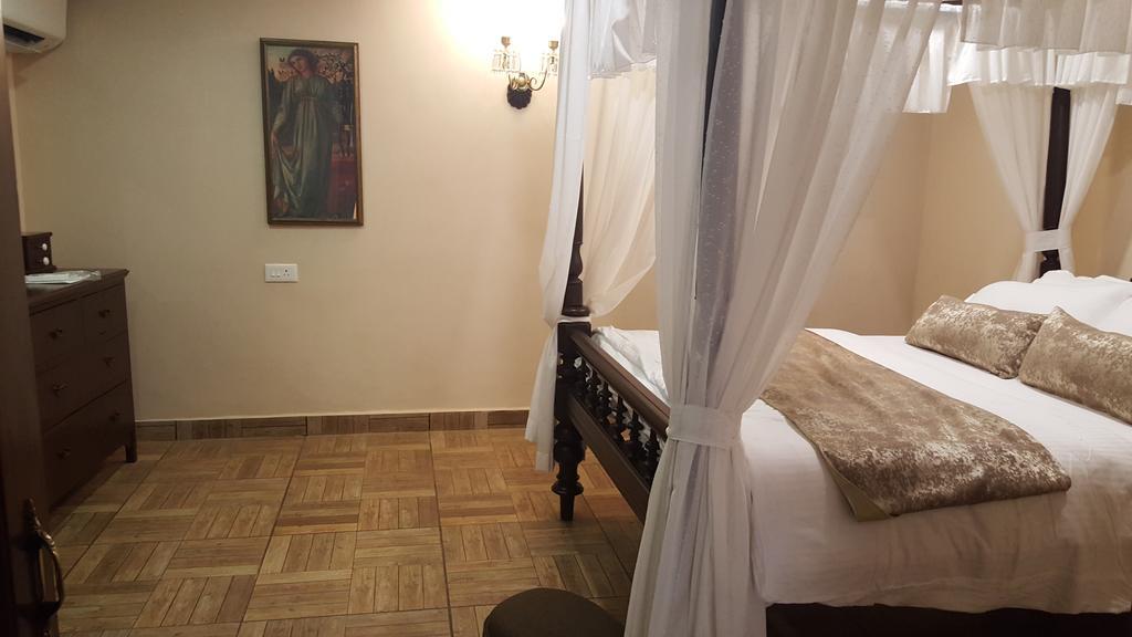 Casa Menezes - A Heritage Goan Homestay Bambolim Rum bild