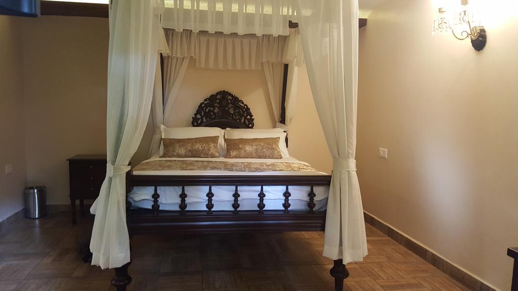 Casa Menezes - A Heritage Goan Homestay Bambolim Rum bild