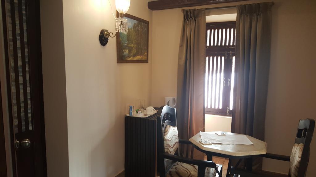 Casa Menezes - A Heritage Goan Homestay Bambolim Rum bild